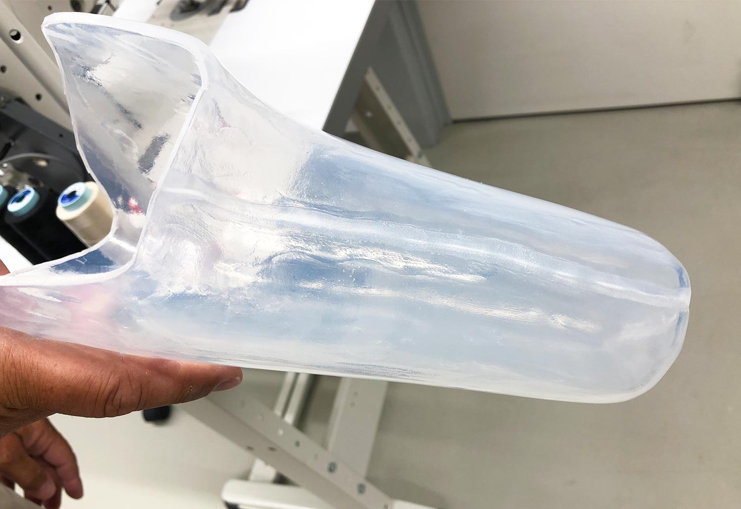 Finished semi-clear thermoplastic transtibial socket