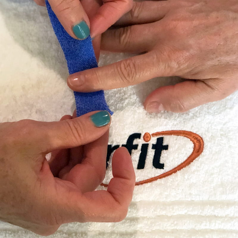 Wrapping Orficast around the patient's finger